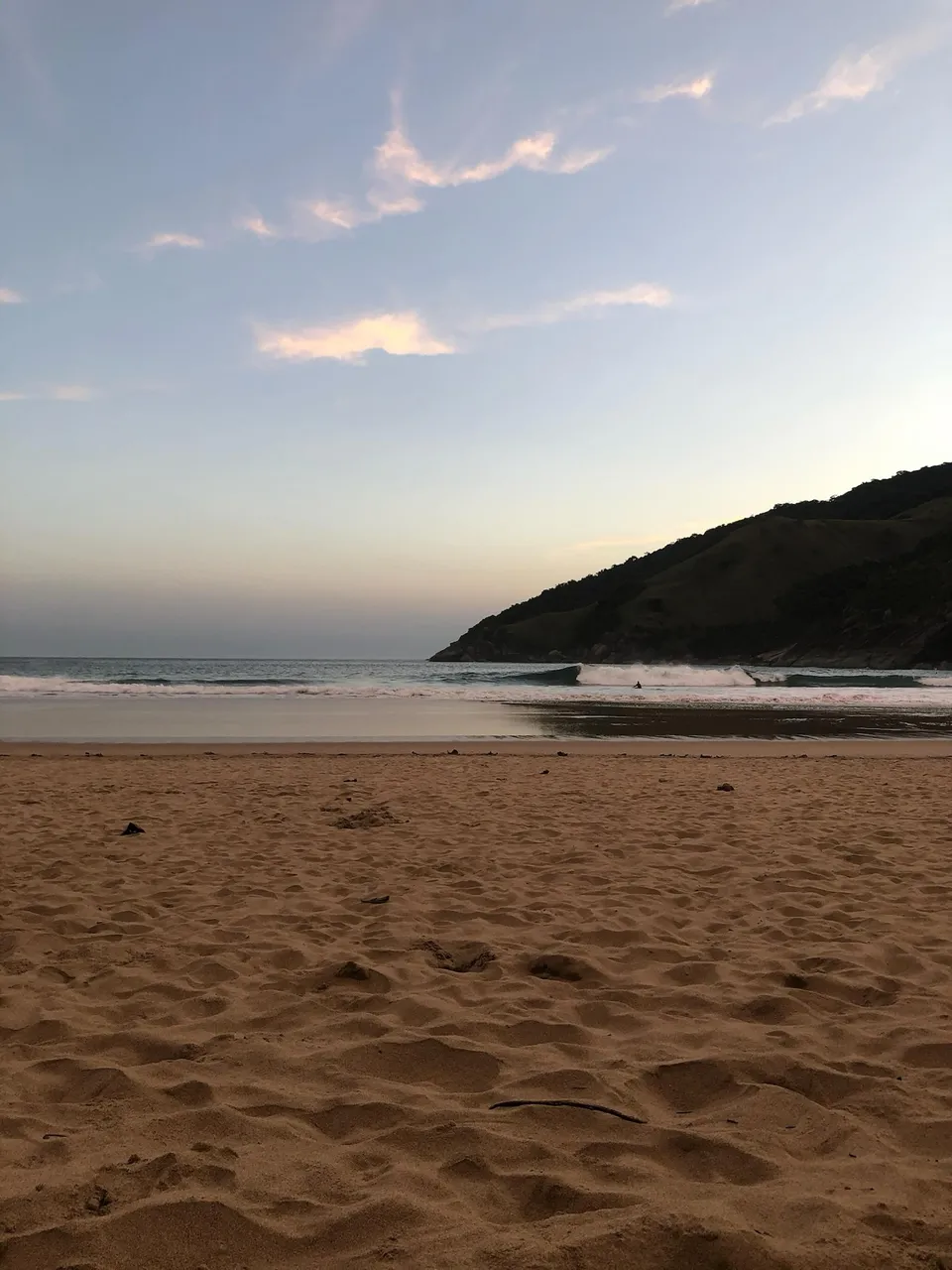 Areia da praia ao fim da tarde